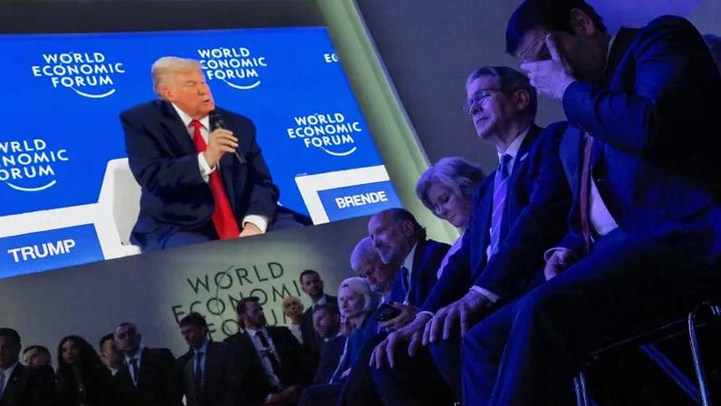 Members of U.S. President Donald Trump's cabinet listen to his address at the World Economic Forum in Davos, Switzerland, on Jan. 21.