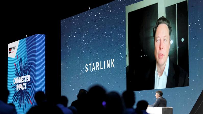 SpaceX founder and Tesla CEO Elon Musk speaks on a screen during the Mobile World Congress (MWC) in Barcelona, Spain, June 29, 2021. REUTERS/Nacho Doce/File Photo