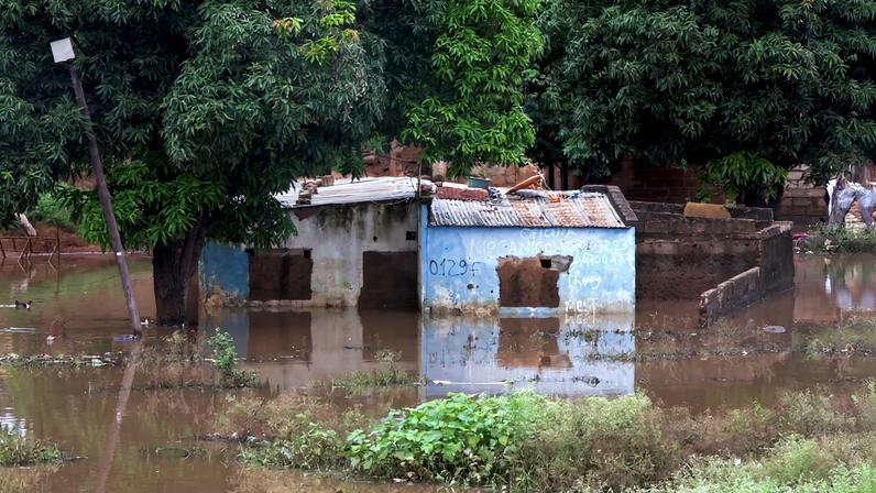 A house stands partially submerged in floodwater after weeks of heavy rainfall in Maputo, Mozambique, January 21, 2026. REUTERS/Amilton Neves
