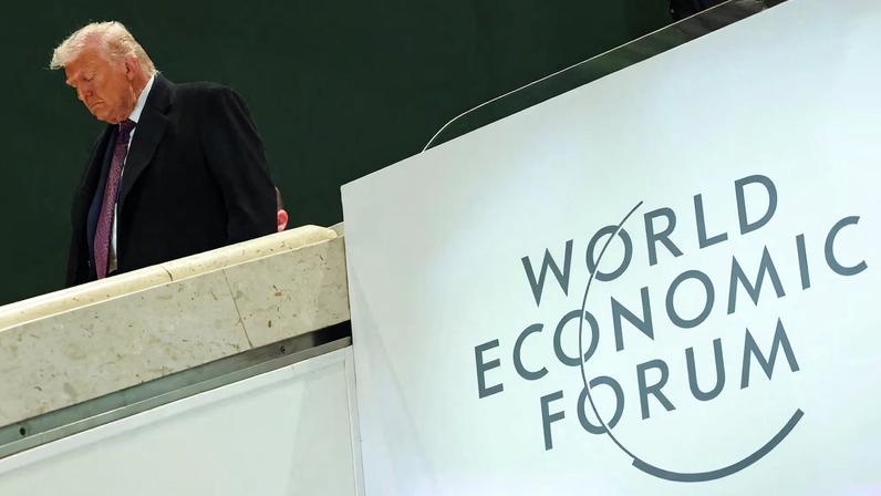 U.S. President Donald Trump walks during the 56th annual World Economic Forum (WEF) meeting in Davos, Switzerland, January 22, 2026. REUTERS/Denis Balibouse