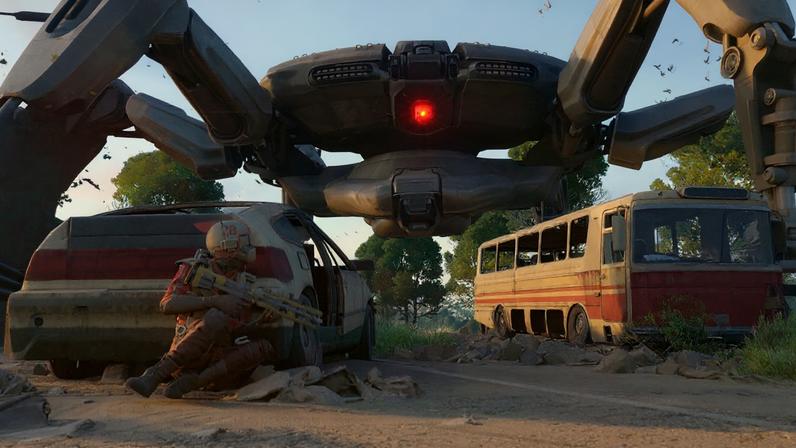 A player hides behind a car from an enormous bot.