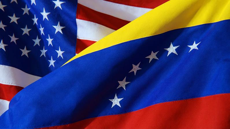 Ilustração mostra bandeiras dos EUA e da Venezuela 2/12/2025 REUTERS/Dado Ruvic