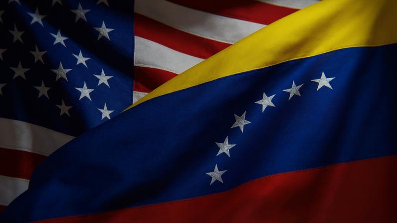 Ilustração mostra bandeiras dos EUA e da Venezuela 2/12/2025 REUTERS/Dado Ruvic