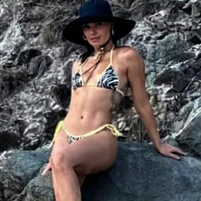 Isis Valverde é fotografada de biquíni em Noronha durante viagem com o marido