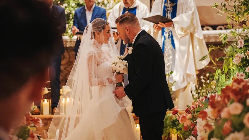 Samantha Leonard posted emotional photos from her wedding to Zach Bryan on Friday.