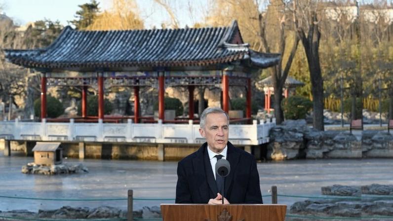 Canadian Prime Minister Mark Carney speaks during a press conference in Beijing.