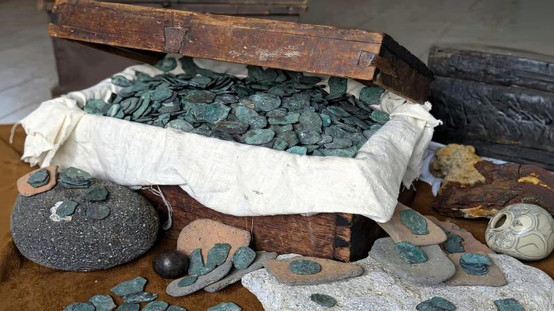 A chest of coins discovered during a salvage operation last summer. More than 1,000 coins were hauled from the sea, believed to have been minted in Spain’s South American colonies in the late 17th and early 18th centuries