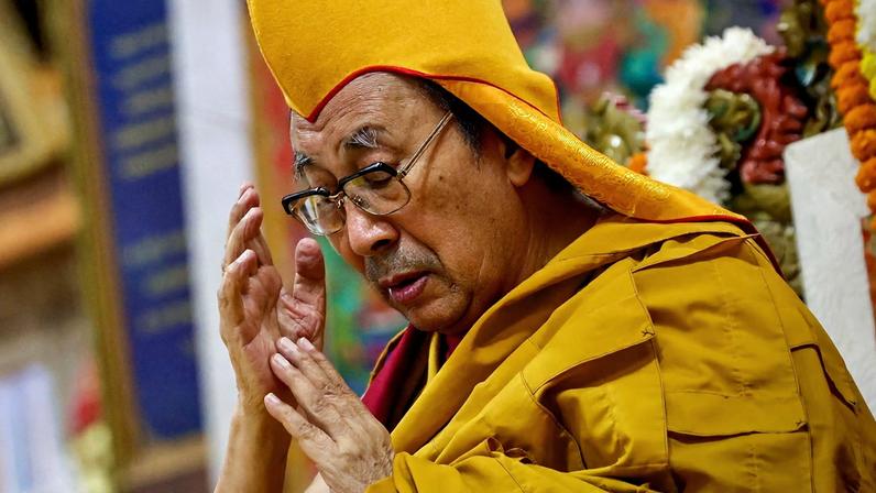 Tibetan spiritual leader the Dalai Lama attends a long-life prayer offering ceremony at the Main Tibetan Temple in McLeod Ganj, near Dharamsala on July 5, 2025. The Dalai Lama said on July 5 he dreamed of living for decades more, as the Buddhist spiritual leader prayed with thousands of exiled Tibetans on the eve of his 90th birthday.