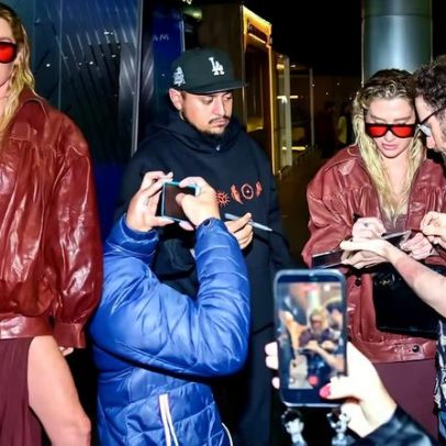 Kesha atende fãs no aeroporto de Guarulhos após show
