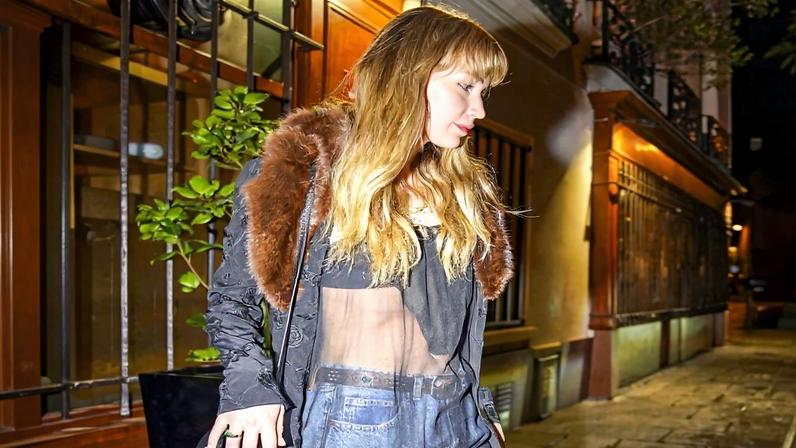 Jennifer Lawrence looked sensational in a sheer black top while out to dinner in Paris during Paris Fashion Week.