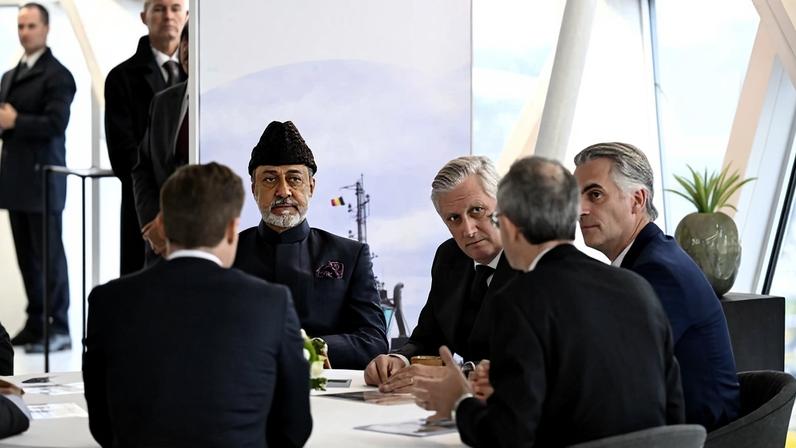Sultan of Oman Haitham bin Tariq (seated, second from left), King Philippe of Belgium, and Economic Advisor to the King Brent Van Tassel are seen during a royal visit to the Havenhuis in Antwerp, Belgium, on Dec. 4, 2024.