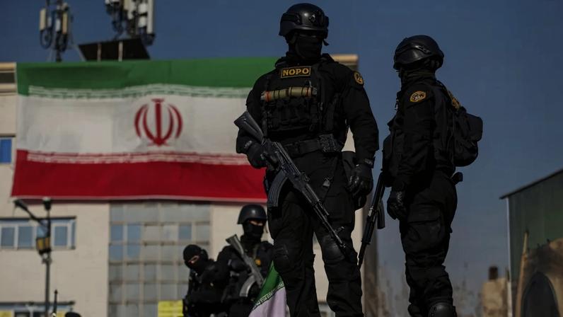 Security forces at a pro-government rally on January 12, 2026 in Tehran, Iran.