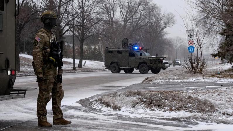 Law enforcement carry out an arrest in St. Paul, Minnesota on Jan. 16.