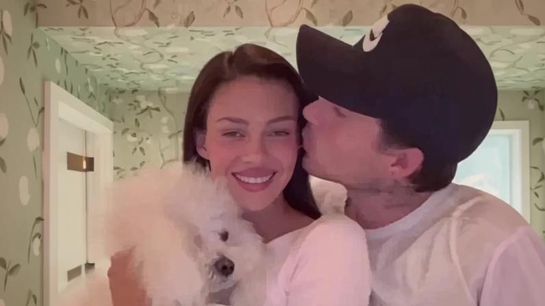 Nicola Peltz shared a romantic video montage of her and Brooklyn Beckham hours after his family stepped out together at Paris Fashion Week.