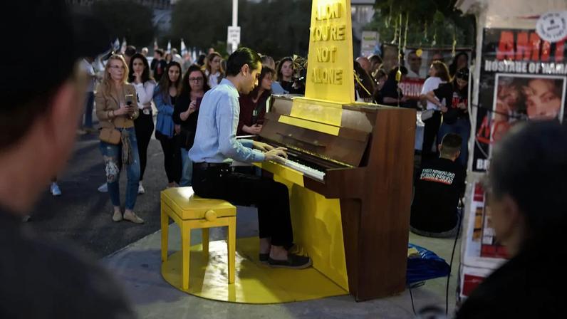 Israelis gathered at the ''Hostages Square'' outside the Art Museum of Tel Aviv as the first group of Israeli hostages safely returned to Israel