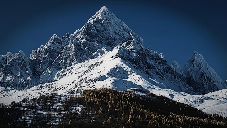 Getty Images Snow covering the rocky slopes of Monviso in the Italian alps (Credit: Getty Images)