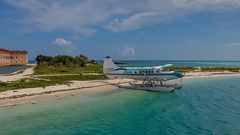 Alamy A seaplane parked on the beach at Dry Tortugas National Park, Florida