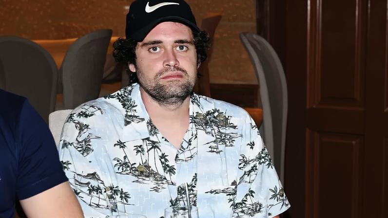 Nick Reiner, pictured above in September 2024, is reportedly no longer on suicide watch.