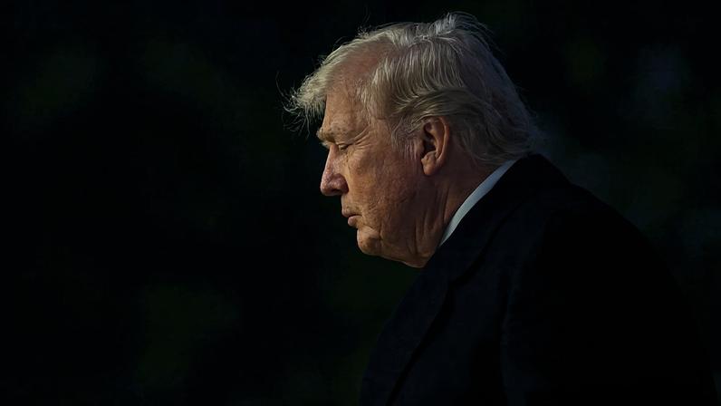 U.S. President Donald Trump walks on the South Lawn after landing at the White House in Washington on Jan. 4.