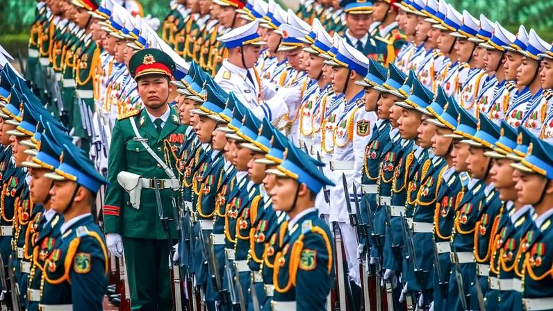 Members of Vietnam’s honor guard prepare ahead of a welcoming ceremony at the presidential palace in Hanoi on Jan. 26.