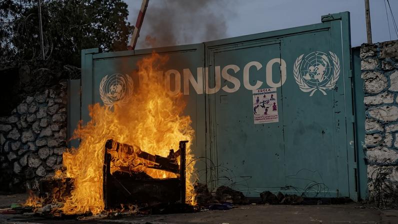 A fire set by protesters burns in front of the U.N. peacekeeping mission in the Democratic Republic of the Congo in Goma on July 25, 2022.