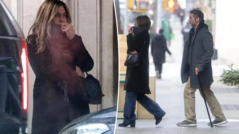Jennifer Aniston and Jim Curtis, pictured here on Friday. were seen touring a luxury apartment in NYC.