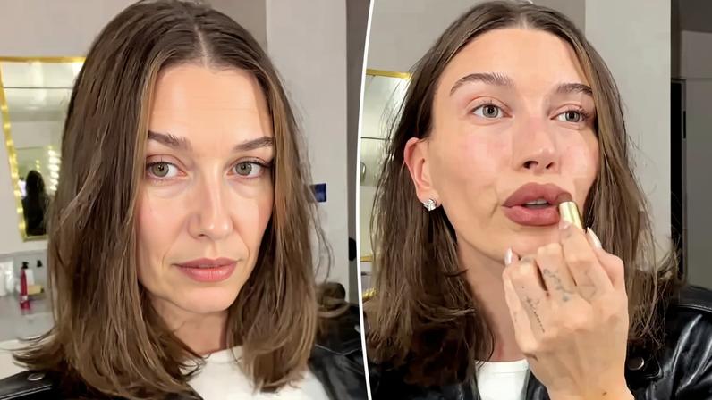 Hailey Bieber applying rose brown lipstick