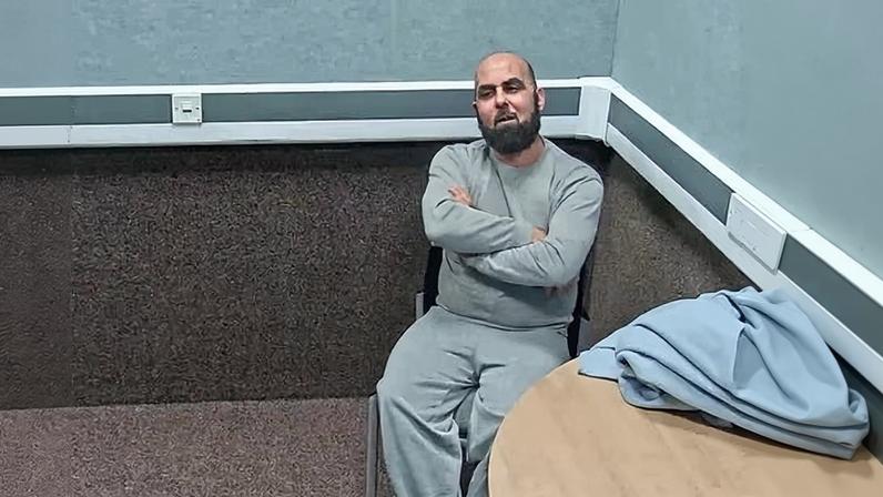 Amar Hussein in police custody