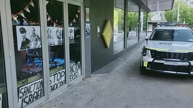 Five posters showing leaders in Nazi uniforms were seized from Canberra’s Dissent Cafe and Bar and will be investigated to determine whether charges will be laid under hate symbols laws.