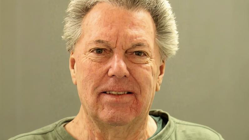 William Stevenson poses for a booking photo in New Castle, Delaware, on 2 February.