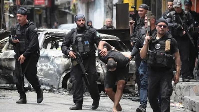 In October 2025, 122 people were killed in what would become Rio’s deadliest police operation. A team of journalists across the Guardian has pieced together police body-camera footage, satellite imagery and pictures and video posted to social media to get the clearest picture to date of what happened that day.