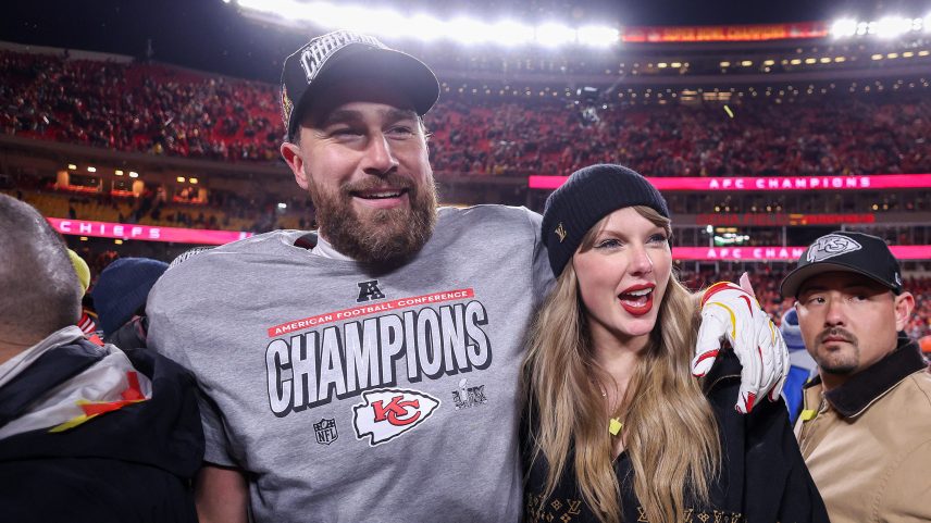 Travis Kelce made a surprise appearance at the “Tight Ends & Friends” party in San Francisco, Calif., Thursday night — with Taylor Swift by his side in spirit.