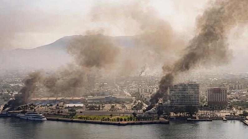 An aerial photograph shows plumes of smoke rising after violent reactions to the killing of Nemesio Ruben Oseguera Cervantes, known as El Mencho, leader of the Jalisco New Generation Cartel, in Puerto Vallarta, Mexico