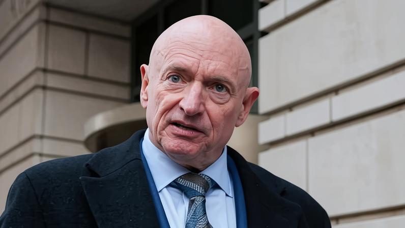 Mark Kelly speaks after departing federal court on 3 February 2026 in Washington DC.