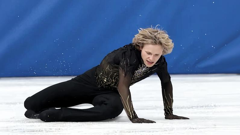 Ilia Malinin takes a fall in the men’s figure skating final.