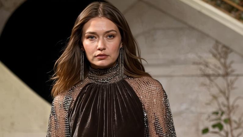 Gigi Hadid wears a velvet gown on the runway at the Ralph Lauren show, New York.