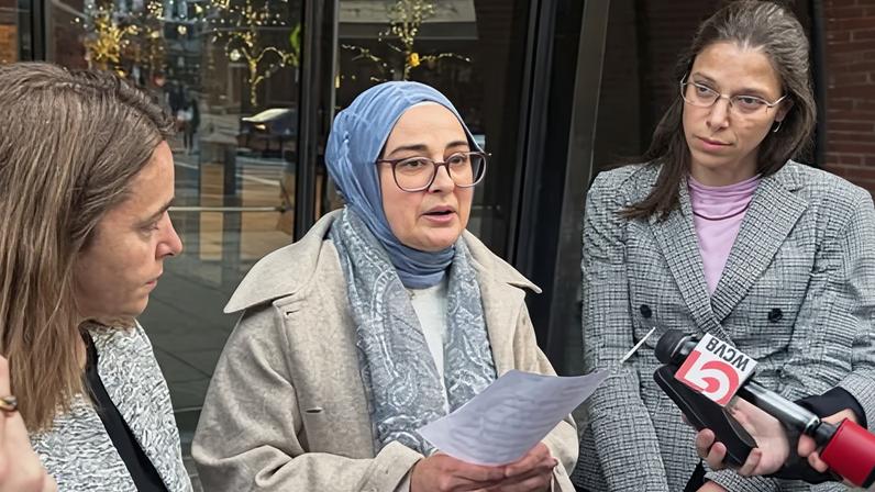 Rümeysa Öztürk speaks to reporters outside the federal court in Boston in 2025.