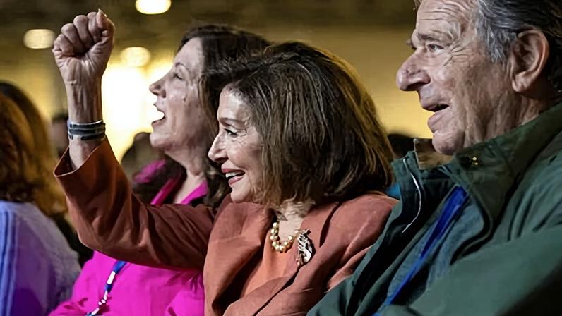 Speaker emerita Nancy Pelosi raises her fist during the California Democratic convention in San Francisco, California, on 21 February.