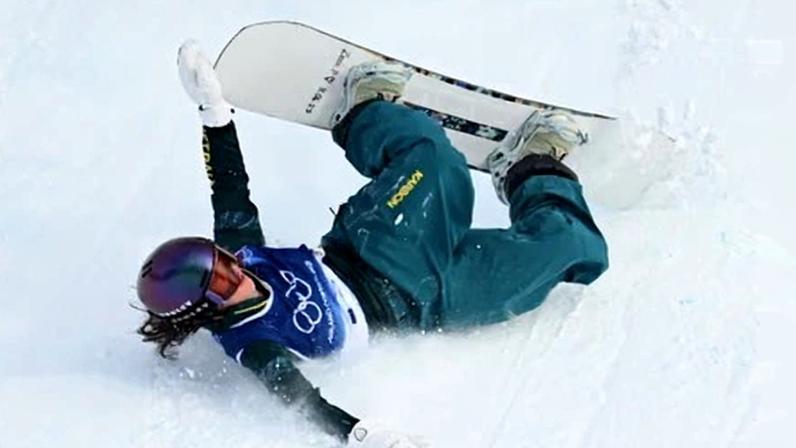 Australia's Ally Hickman crashes in the women's snowboard slopestyle final in Livigno on the way to finishing seventh at the 2026 Winter Olympic Games.
