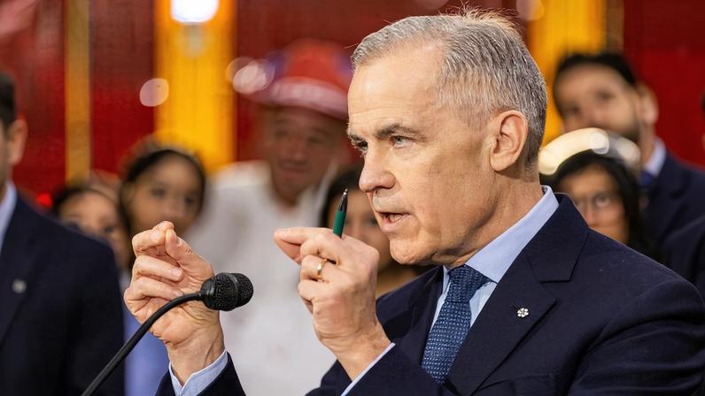 Canada's Prime Minister Mark Carney speaks to the media after touring auto parts manufacturer Martinrea Industries in Woodbridge, Ontario, Canada, February 5, 2026. REUTERS/Carlos Osorio