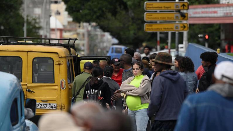 People wait for transportation as Cubans brace for fuel scarcity measures after U.S. tightened oil supply blockade, Havana, Cuba, February 6, 2026. REUTERS/Norlys Perez