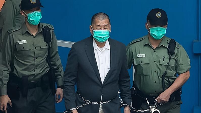 Jimmy Lai being escorted into court on Monday.