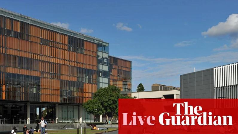 Students sit on the lawn at the University of Sydney. The racism discrimination commissioner says racism is ‘systemic’ at Australia’s universities.