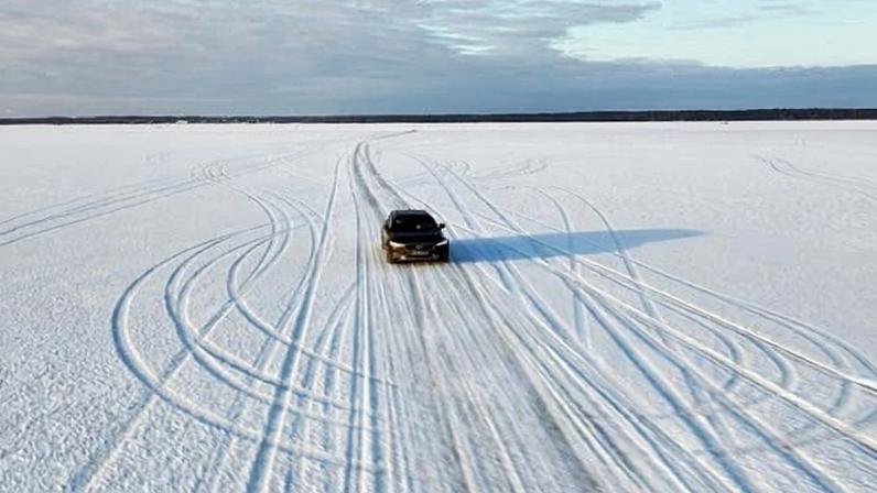 A drone view shows a car driving on the first official ice road of the season, opened between Estonian islands Hiiumaa and Saaremaa.