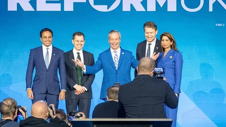 Nigel Farage is flanked by Zia Yusuf, Robert Jenrick, Richard Tice and Suella Braverman at a Reform press conference in London