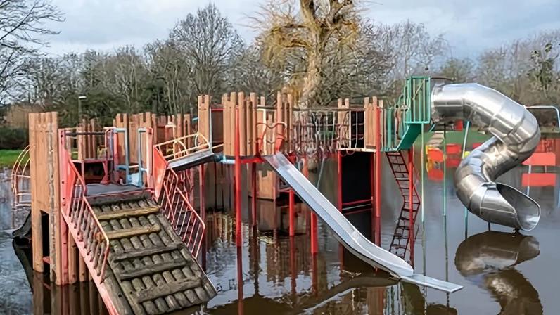 Flooding in the Gogmore Farm children's play area in Chertsey, Surrey.
