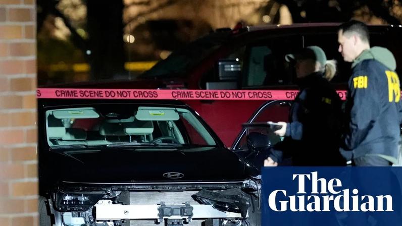 Law enforcement officials work the scene following reports that federal immigration officers shot and wounded people in Portland, Oregon