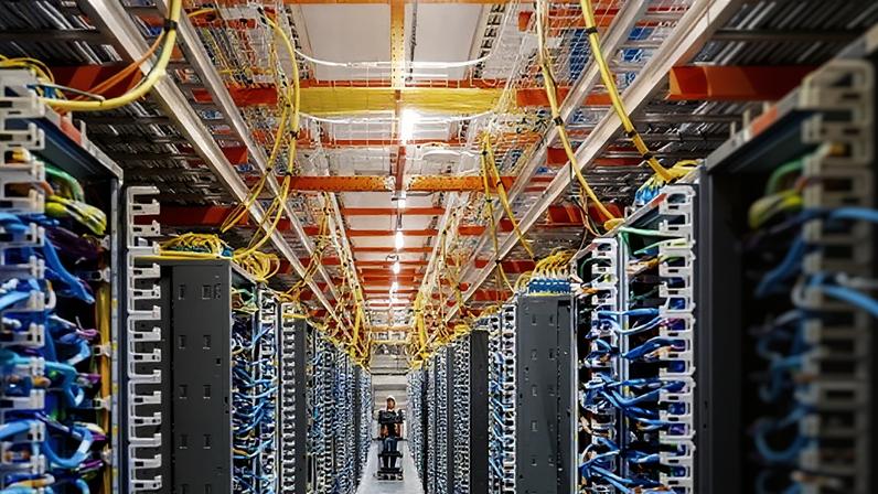 A technician works at an Amazon Web Services AI datacentre in New Carlisle, Indiana.