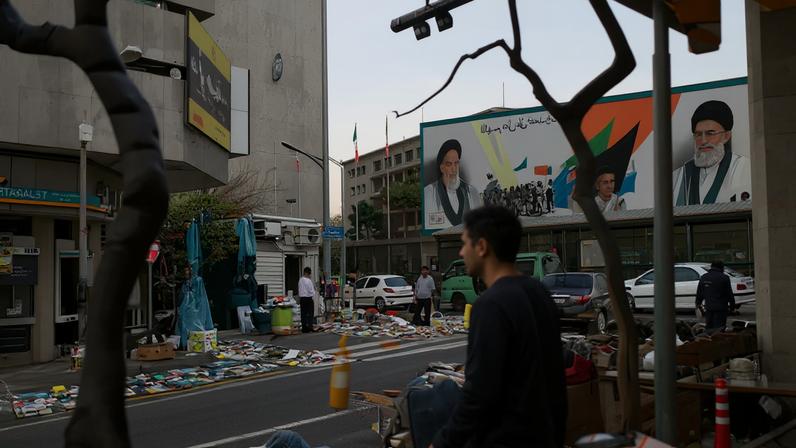 A sign with a depiction of Iran's Supreme Leader, Ayatollah Ali Khamenei, is reflected in a shop window in Tehran, Iran, February 19, 2026. Majid Asgaripour/WANA (West Asia News Agency) via REUTERS/File Photo