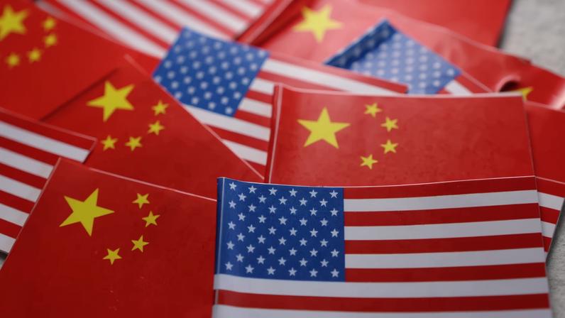 U.S. and Chinese flags are seen in this illustration taken March 20, 2025. REUTERS/Dado Ruvic/Illustration